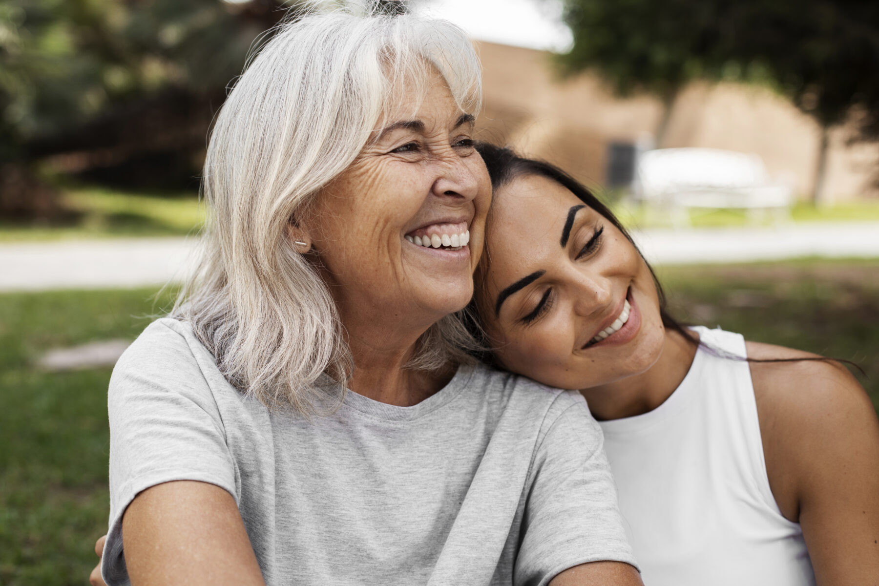 Elderly person with younger family member
